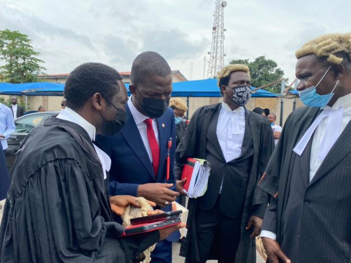 Bawa with lawyers