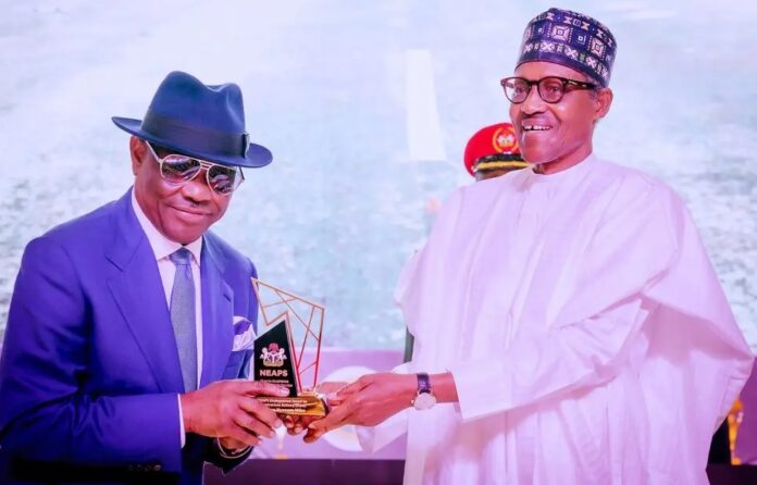 Buhari presents award to Wike