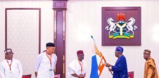 Tinubu presents APC flag to Sen Okpebholo, says party on victory part in Edo guber