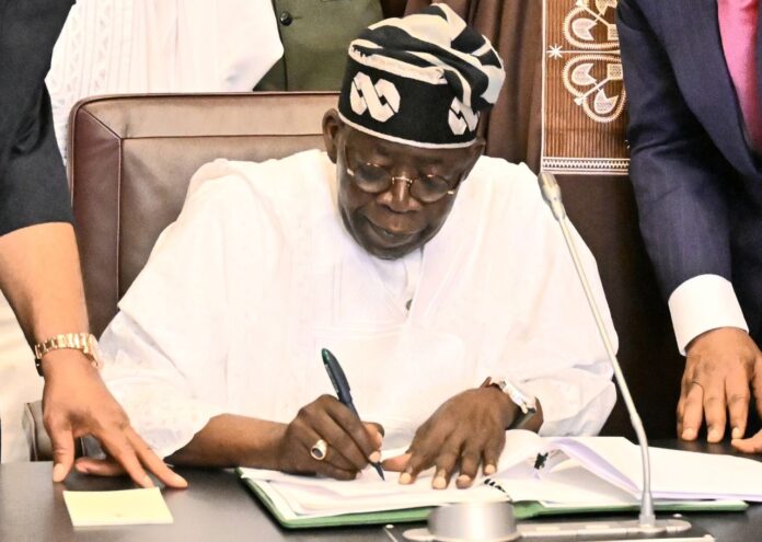 Tinubu signs