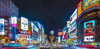 Asian markets climb as US data eases recession fears