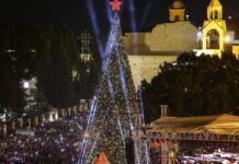 Bethlehem Christmas tree lit up for first time since Gaza war